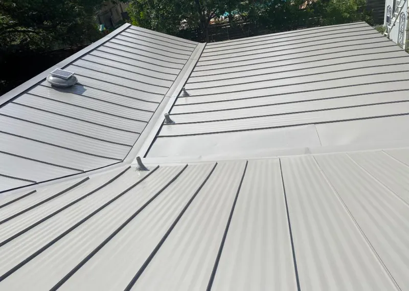 Solar attic fan installed on a metal roof for Roof Ventilation in La Mirada